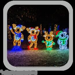 Vianočná dekorácia - Sada 4 postáv so sobmi a LED snehuliakom