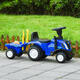 Traktor na jazdu New Holland s prívesom a interaktívnym volantom pre deti - modrý